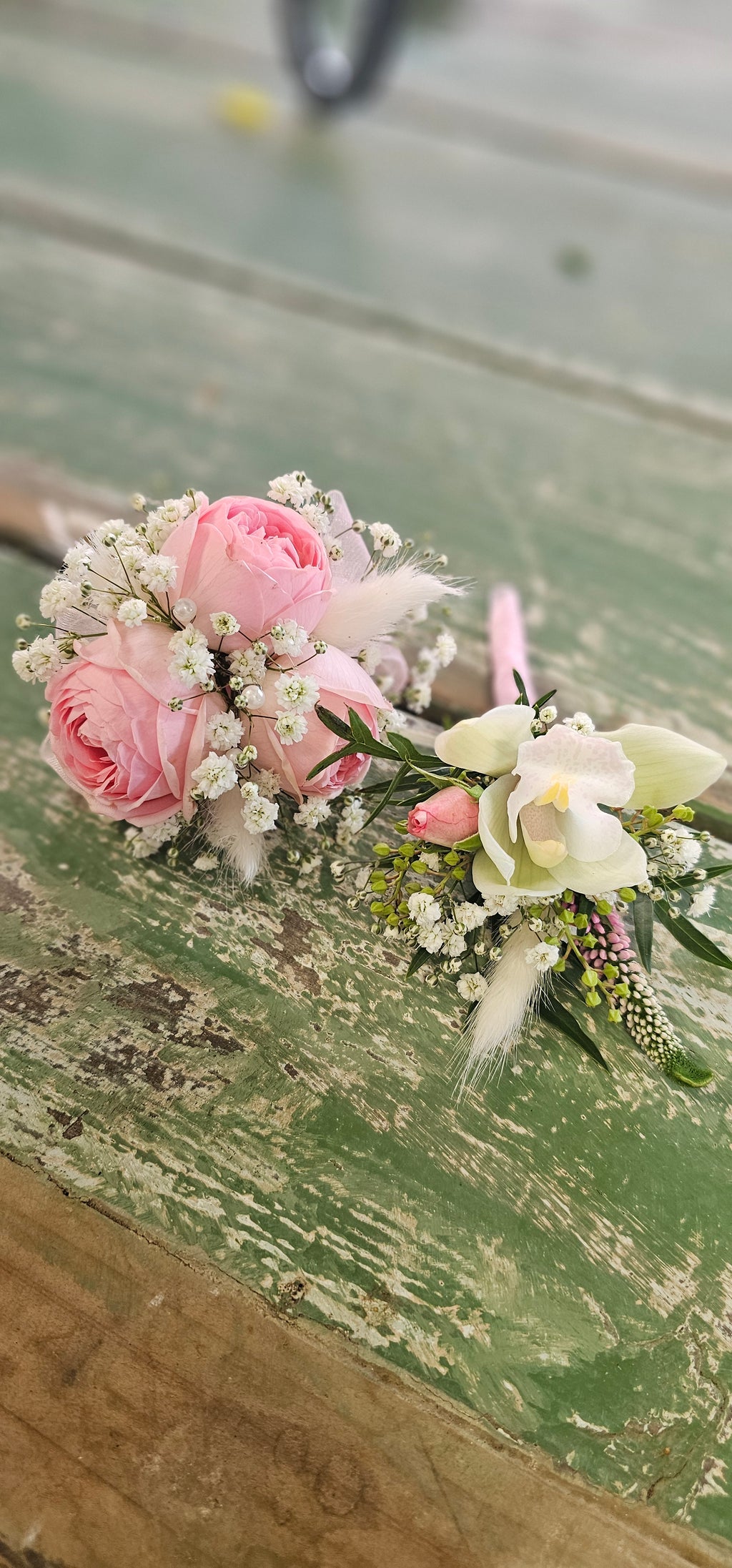 Corsage and buttonhole with pink and white flowers 
