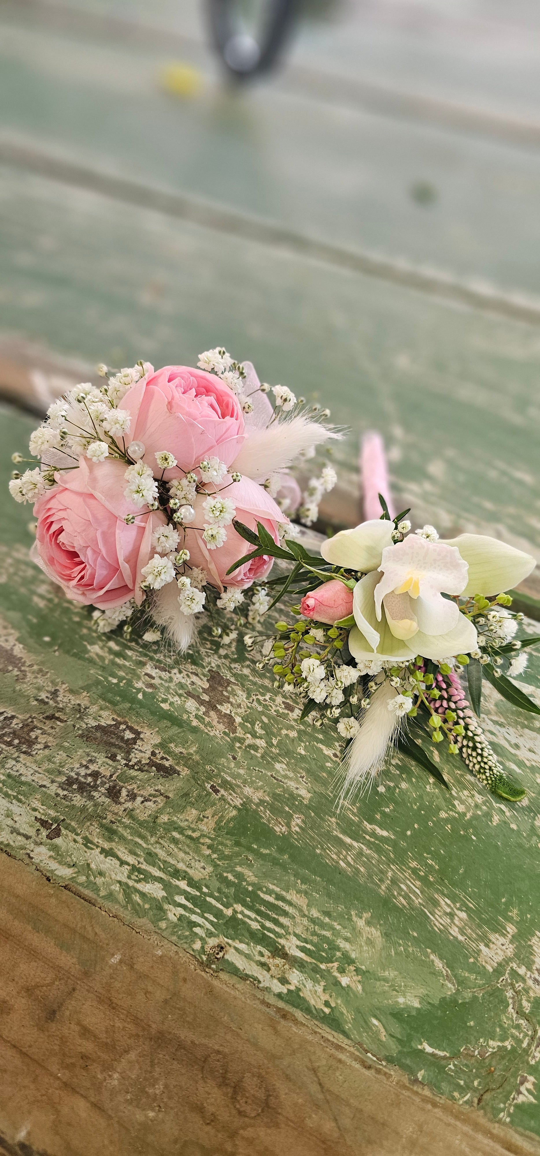 Corsage and buttonhole with pink and white flowers 
